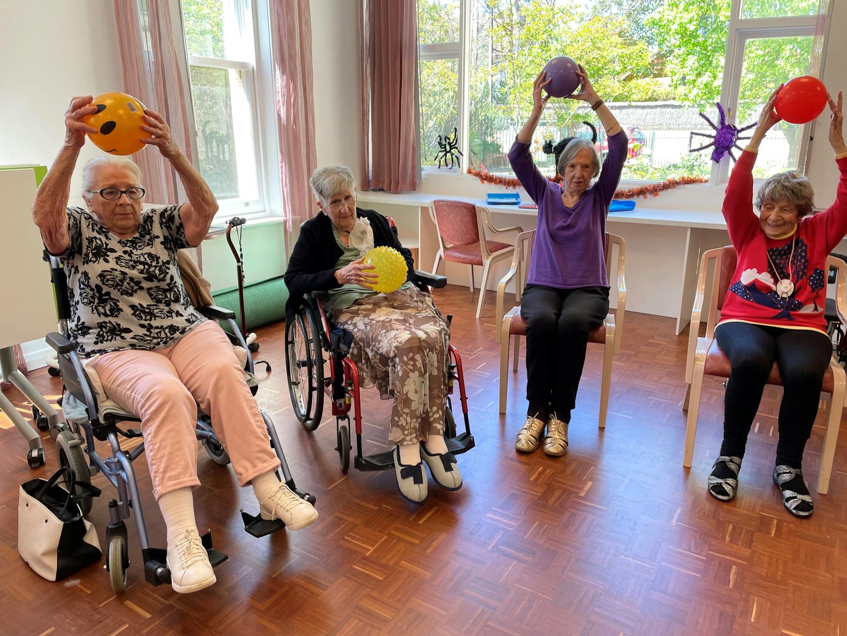 Residents exercising in a senior living community